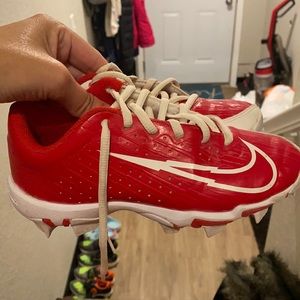 Red Nike boys baseball cleats. Like new. Worn three times. Purchased new. $25